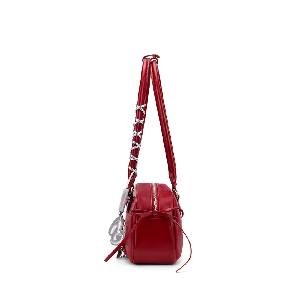 The Bow-Tique Baguette Split Leather Shoulder Bag