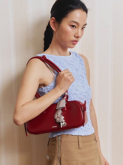 The Bow-Tique Baguette Split Leather Shoulder Bag