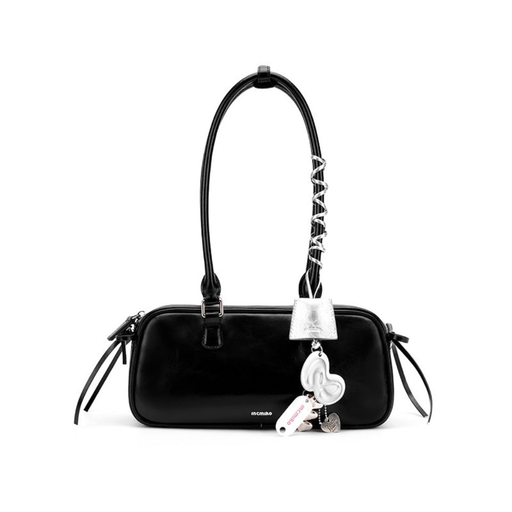 The Bow-Tique Baguette Split Leather Shoulder Bag